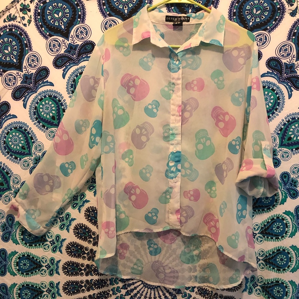 Derek heart shirt.
